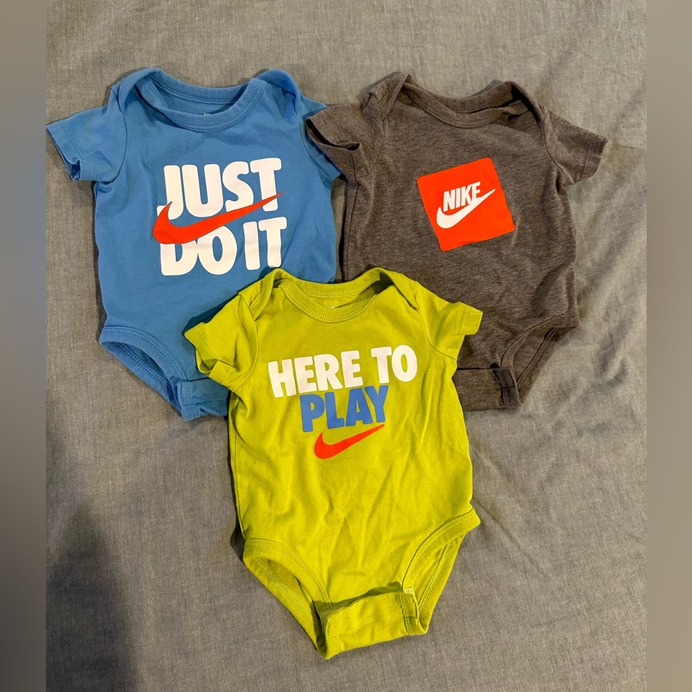 Nike baby onesies